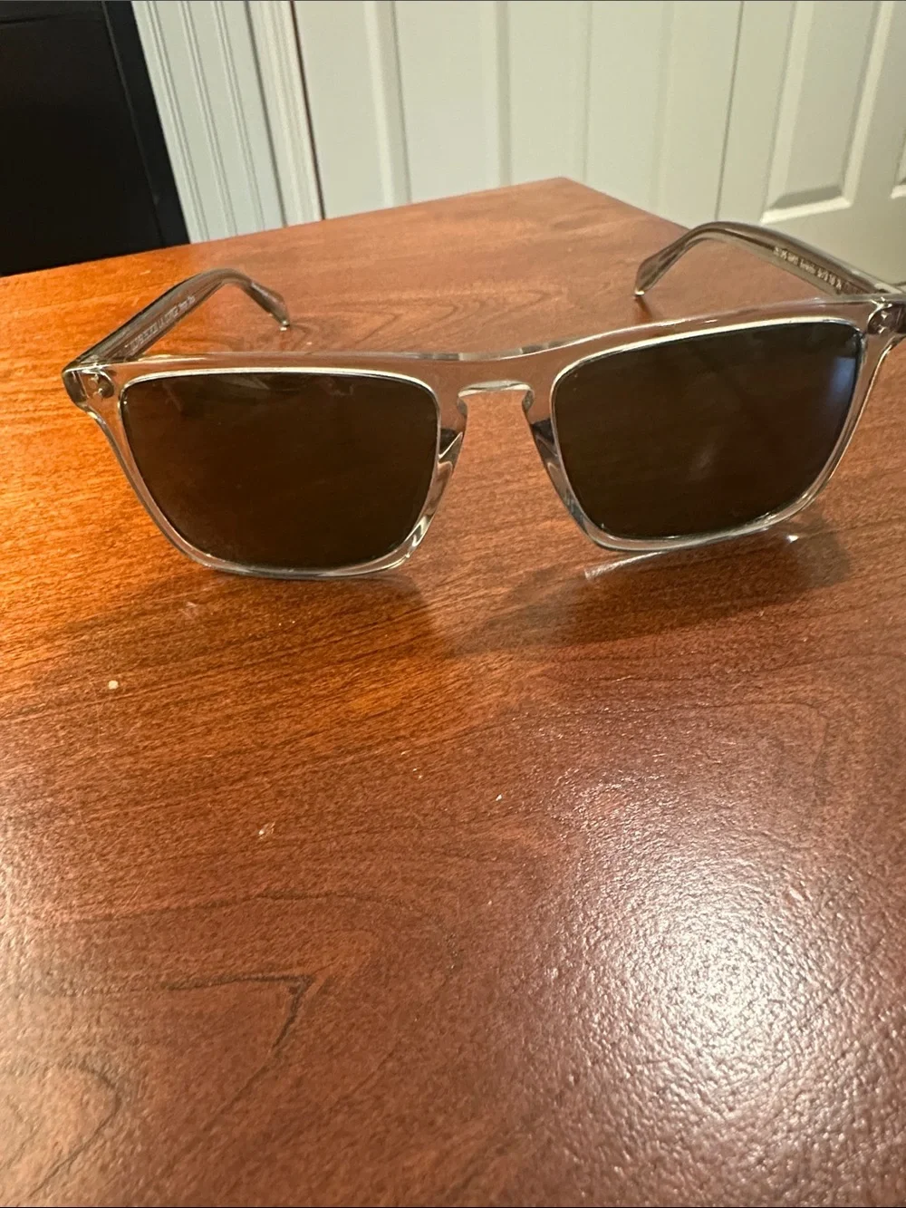 Oliver Peoples Clear Frame Sunglasses with Brown Lenses